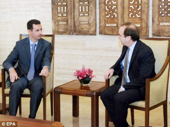 1.1 dignity & loyality (Pink lilys and ivy) «Tory whip Brooks Newmark (right) spent three hours on Sunday with President Bashar al-Assad (left) who has been bla- med for authorising the deaths of hundreds of pro-democracy protesters» June 27, 2011 | Damascus